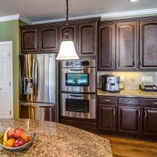 Kitchen cabinet refinishing to a rich furniture finish